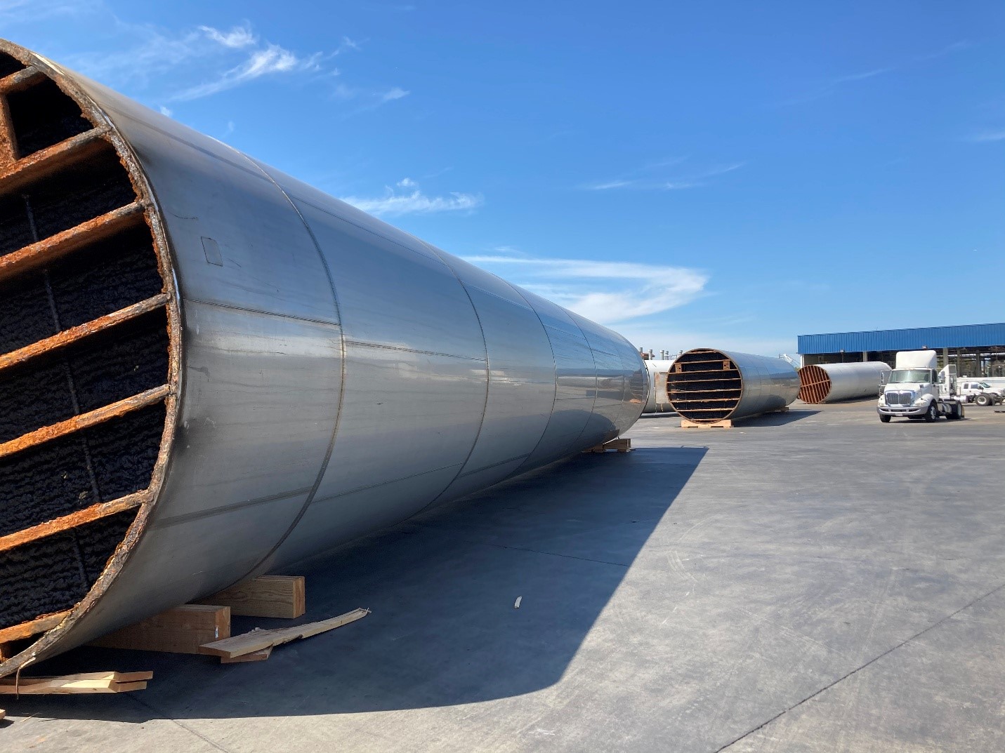 DECONTAMINATION AND DECOMMISSIONING OF ELEVEN CHEMICAL AND FOOD STORAGE SILOS